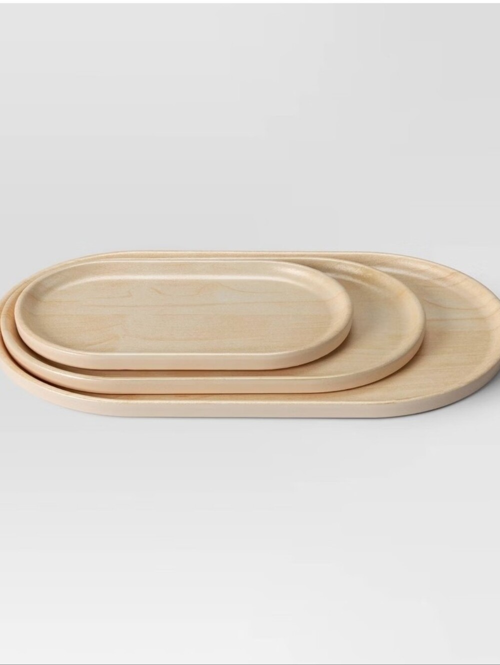 Bamboo melamine printed tray set features a stacked design in a light yellow col